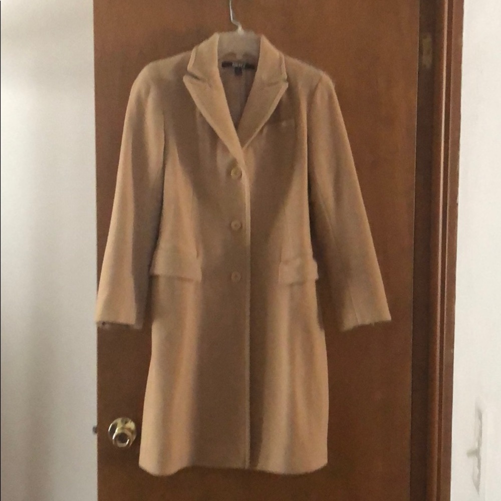 Camel colored knee length wool coat.